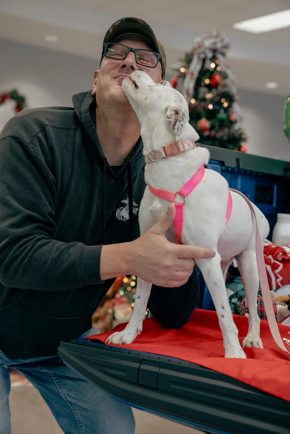June Bug sharing a happy moment with her adopter after the Pettus Ford De Soto event