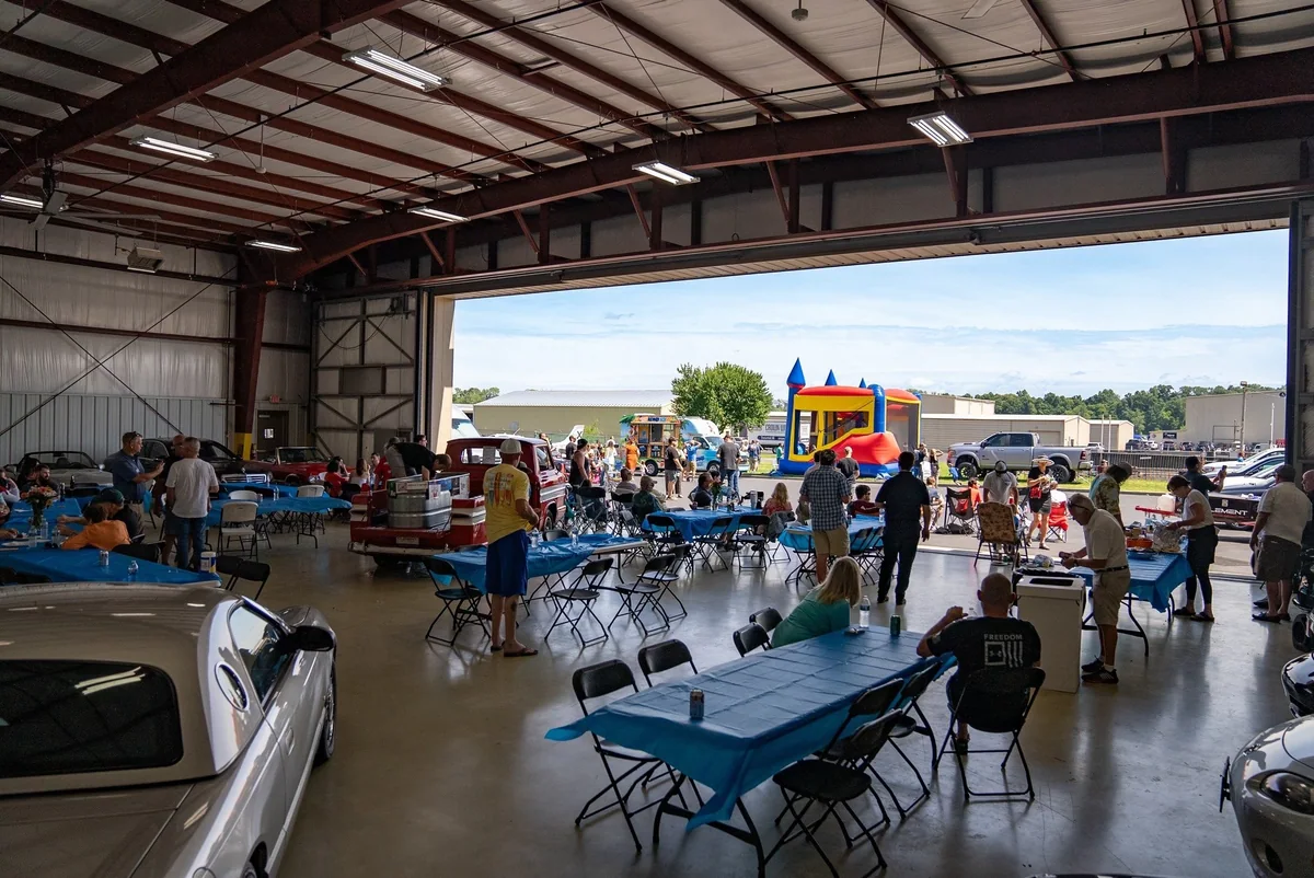 Pettus team members and families gathered at the Blue Angels event