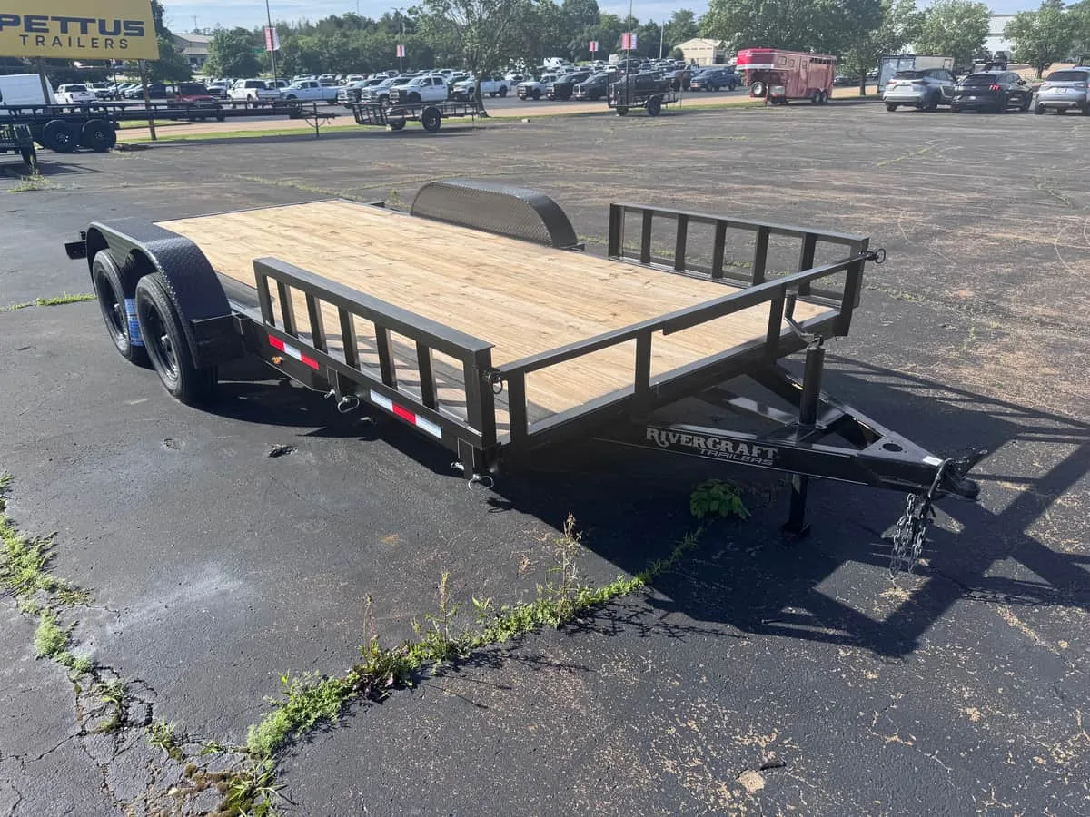 Black tandem-axle utility trailer on the Pettus Trailers lot